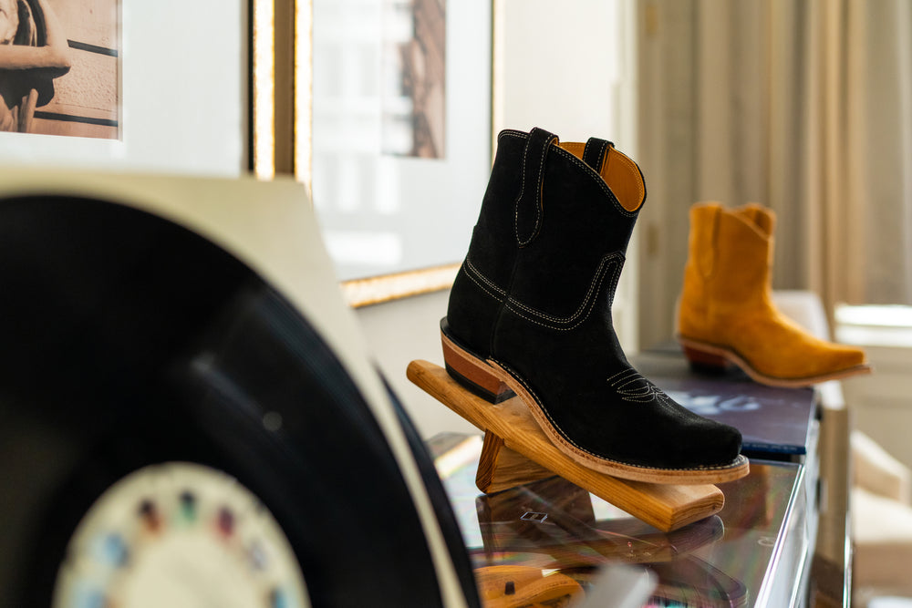 
                  
                    The Abella Snip Toe Ankle Boot with Black Italian Suede on display in Alberta Boot
                  
                