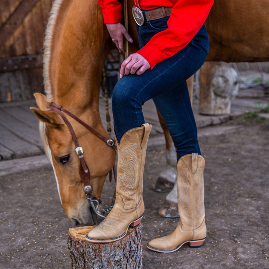 
                  
                    Woman Wearing Tall Cowgirl Boots
                  
                